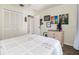Cozy bedroom with hardwood floors, neutral paint, a ceiling fan, and ample natural light at 2926 Dickens Cir, Kissimmee, FL 34747