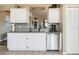 Kitchen with ample counter space, stainless steel appliances, and plenty of white cabinets at 2926 Dickens Cir, Kissimmee, FL 34747
