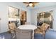 Screened-in patio with outdoor seating, providing a relaxed place for dining and entertaining guests at 2926 Dickens Cir, Kissimmee, FL 34747