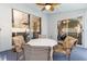 Relaxing patio with large sliding glass doors and comfortable seating, perfect for enjoying outdoor living at 2926 Dickens Cir, Kissimmee, FL 34747