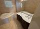 Dual sink vanity and soaking tub at 3074 Bay Laurel N Cir, Kissimmee, FL 34744