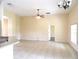 Spacious living room featuring tile flooring and neutral paint, offering a versatile space for relaxation and entertainment at 3074 Bay Laurel N Cir, Kissimmee, FL 34744