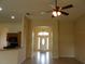 View from living room towards front door and kitchen at 3074 Bay Laurel N Cir, Kissimmee, FL 34744