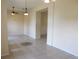 Spacious living area showcasing tile floors, neutral walls, and a seamless open layout at 3074 Bay Laurel N Cir, Kissimmee, FL 34744