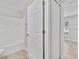 Bathroom view showing the shower-tub combo and access to another room at 3274 Hunters Chase Loop, Kissimmee, FL 34743