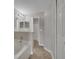 Bathroom featuring a bathtub, tile floors, a closet, and neutral colored walls at 3274 Hunters Chase Loop, Kissimmee, FL 34743