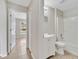Bathroom with a shower-tub combo, single sink vanity, and tile flooring at 3274 Hunters Chase Loop, Kissimmee, FL 34743