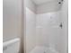 Bathroom shower with white tile and neutral color walls at 3274 Hunters Chase Loop, Kissimmee, FL 34743