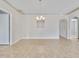 Dining room featuring neutral paint, tile flooring and modern lighting at 3274 Hunters Chase Loop, Kissimmee, FL 34743