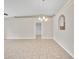 Bright dining room featuring tile flooring and a modern chandelier at 3274 Hunters Chase Loop, Kissimmee, FL 34743