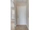Bright entryway featuring tile flooring and a classic white front door at 3274 Hunters Chase Loop, Kissimmee, FL 34743