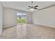 Bright living room with sliding glass doors and outdoor views at 3274 Hunters Chase Loop, Kissimmee, FL 34743