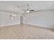 Spacious living room featuring tile flooring and neutral colors at 3274 Hunters Chase Loop, Kissimmee, FL 34743