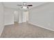 A living room featuring neutral paint, tile flooring and a ceiling fan at 3274 Hunters Chase Loop, Kissimmee, FL 34743