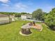 Community playground with gazebo, slide, and play equipment on a sunny day at 3274 Hunters Chase Loop, Kissimmee, FL 34743