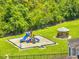 Playground and gazebo surrounded by lush green trees at 3274 Hunters Chase Loop, Kissimmee, FL 34743