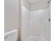 Shower featuring white tiling and updated fixtures at 3274 Hunters Chase Loop, Kissimmee, FL 34743