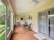 Inviting screened patio with outdoor seating provides a relaxed space for enjoying the outdoors at 3428 Village Green Ct, St Cloud, FL 34772