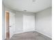 Neutral bedroom features carpeted floors, a double closet, and neutral walls at 3603 Sanctuary Dr, St Cloud, FL 34769
