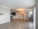 Open living space with tile flooring, crown molding and neutral paint palette at 3603 Sanctuary Dr, St Cloud, FL 34769