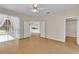 Spacious bedroom with tile floors and double door entry to kitchen at 4065 Kingsley St, Clermont, FL 34711