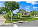 Inviting community entrance with lush landscaping, decorative signage, and manicured greenery, enhancing curb appeal at 4065 Kingsley St, Clermont, FL 34711