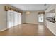 Dining room features tile floors, neutral paint, a large window and an open layout to the kitchen at 4065 Kingsley St, Clermont, FL 34711