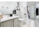 Bathroom vanity with a marble countertop, stylish fixtures, and décor at 4109 Vessel Ct, Kissimmee, FL 34746