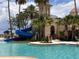 Enjoy the community pool with a fun slide for extra entertainment on a hot day at 4109 Vessel Ct, Kissimmee, FL 34746