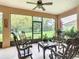 Spacious lanai features a tile floor, screen windows, and a ceiling fan at 4109 Vessel Ct, Kissimmee, FL 34746