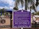Sign outlining rules for interactive water park area, ensuring safety with no diving and specified hours at 4109 Vessel Ct, Kissimmee, FL 34746