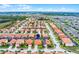 A peaceful neighborhood with nicely kept homes, green spaces, and convenient community layout, aerial view at 423 Paloma Dr, Davenport, FL 33837