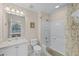 Bathroom featuring a shower-tub combination, neutral wall, a toilet, and a vanity at 423 Paloma Dr, Davenport, FL 33837