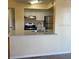 Open floor plan with dining and living area at 429 Fountainhead Cir # 223, Kissimmee, FL 34741
