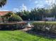 View of a community pool surrounded by greenery at 429 Fountainhead Cir # 223, Kissimmee, FL 34741