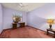 Bedroom featuring a desk for a workspace and carpeted floors at 4307 Oak Ct, St Cloud, FL 34769