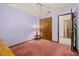 Bedroom featuring a ceiling fan, carpeted floors, an a closet at 4307 Oak Ct, St Cloud, FL 34769
