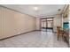 Bright dining area with tile floors, sliding glass doors, and wood bar seating at 4307 Oak Ct, St Cloud, FL 34769