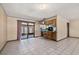 Dining room features sliding doors to an outdoor space and bar-style seating at 4307 Oak Ct, St Cloud, FL 34769