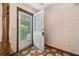 Light and bright entryway with patterned floor tiles and view of the exterior through the decorative door at 4307 Oak Ct, St Cloud, FL 34769