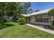 Exterior of home featuring manicured landscaping and a cozy front entrance at 4307 Oak Ct, St Cloud, FL 34769