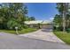 Exterior of home featuring well maintained yard with a charming mailbox at 4307 Oak Ct, St Cloud, FL 34769