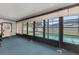 Enclosed lanai with large windows overlooking a screened pool area for outdoor living at 4307 Oak Ct, St Cloud, FL 34769
