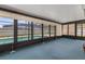 Enclosed lanai with large windows overlooking a screened pool area for outdoor living at 4307 Oak Ct, St Cloud, FL 34769