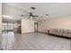 Large living room with an adjacent kitchen area and glass sliding doors at 4307 Oak Ct, St Cloud, FL 34769