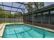 Enjoy this screened-in pool with a view of the backyard landscaping and providing a private outdoor oasis at 4307 Oak Ct, St Cloud, FL 34769