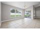 Dining room with recessed lights, tile flooring, and a sliding glass door to the patio at 440 Peppermill Cir, Kissimmee, FL 34758