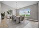 Bright dining area features tile floors, natural light, and modern furnishings at 440 Peppermill Cir, Kissimmee, FL 34758