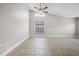 Bright living room featuring tile floors, high ceilings, recessed lighting, and ample natural light at 440 Peppermill Cir, Kissimmee, FL 34758