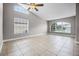 Bright and airy living room with tile floors and lots of natural light at 440 Peppermill Cir, Kissimmee, FL 34758